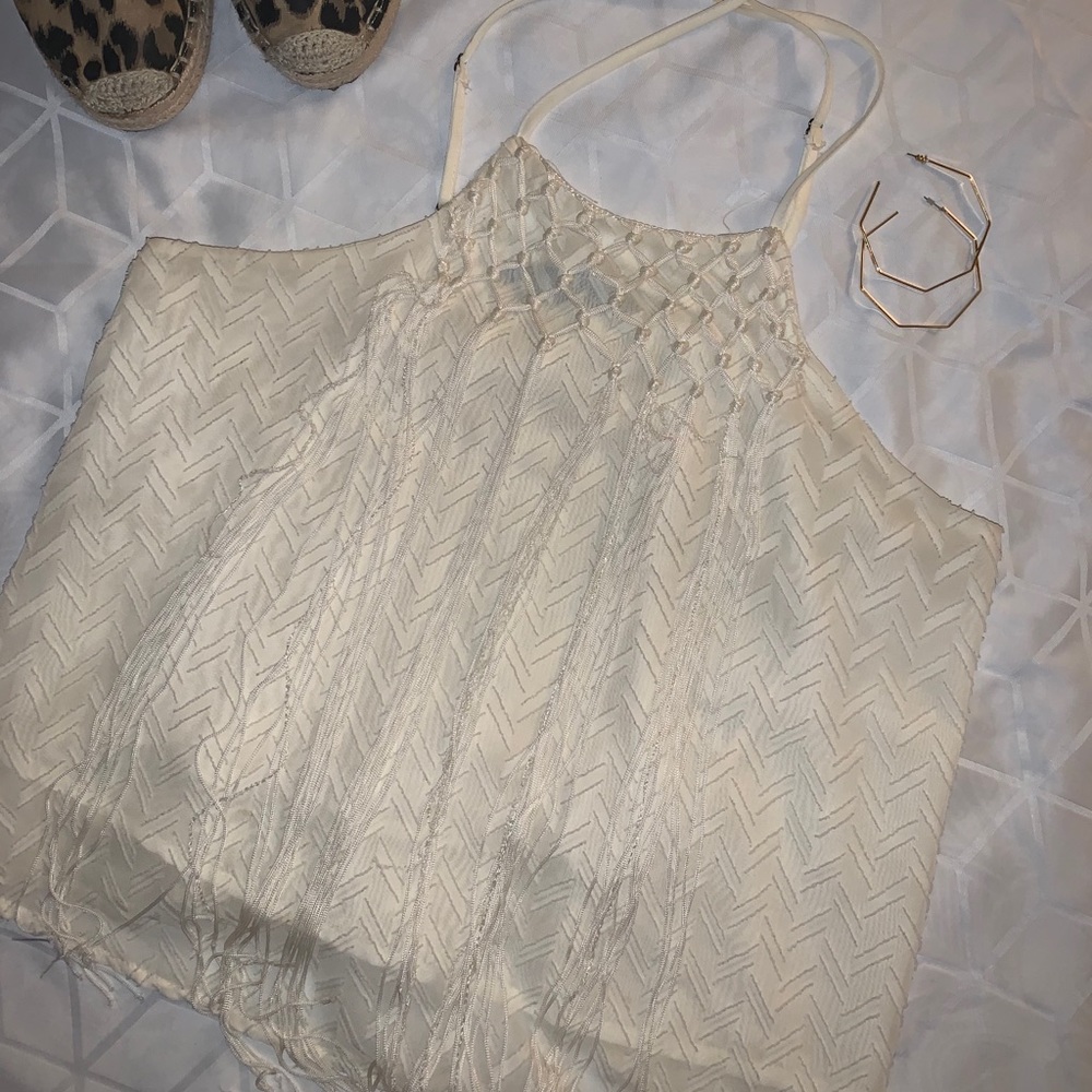 Sleeveless, fringe halter top